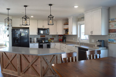 Farmhouse l-shaped eat-in kitchen photo in Other with a farmhouse sink, shaker cabinets, distressed cabinets, solid surface countertops, an island and gray countertops
