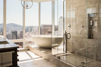 Example of a trendy double-sink freestanding bathtub design in San Francisco