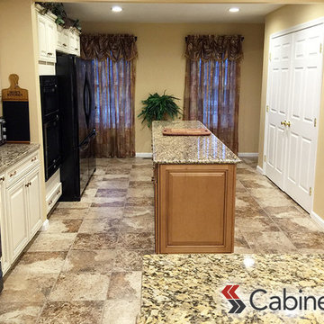 Two-Toned Kitchen with Natural Colors and a Sophisticated Door Style
