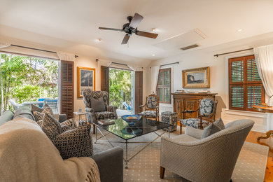 Example of a transitional living room design in Miami