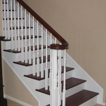 Timeless Traditional Staircase with Wooden Newel Posts and Balusters