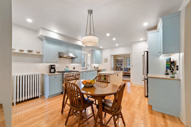 Inspiration for a timeless kitchen remodel in Philadelphia with quartzite countertops and an island