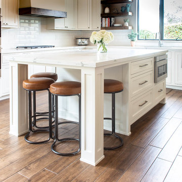 All-new white kitchen cabinetry and kitchen island