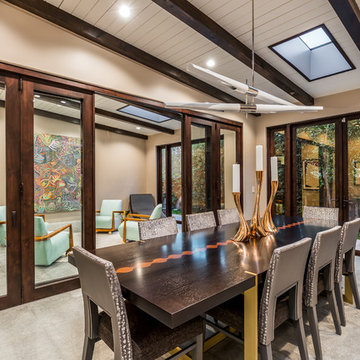 Interior Bi-Fold Doors Separate Formal Sitting Room from Dining Room