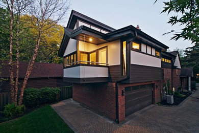 Mid-sized contemporary white two-story concrete fiberboard exterior home idea in Chicago with a shed roof