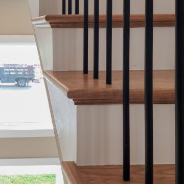Project #153 | Sophisticated Red Oak Stair with Metal Balusters