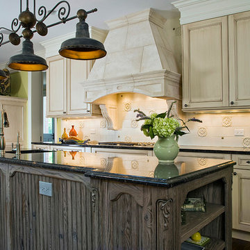 OP Signature Line Raised Panel Cabinetry in Custom Antique White with Glaze