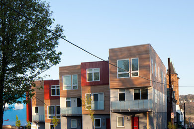 Modern gray concrete fiberboard exterior home idea in Other