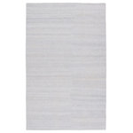 Jaipur Living - Jaipur Living Limon Indoor/ Outdoor Solid Area Rug, Silver/Gray, 6'x9' - Contemporary and versatile, the eco-friendly Rebecca collection offers a sophisticated distressed solid design to high-traffic areas and outdoor spaces. The Limon area rug delivers a fresh accent to patios, kitchens, and dining rooms with its ultra-durable PET yarn hand-woven construction. The silver white colorway lends a modern and sleek tone to any home.