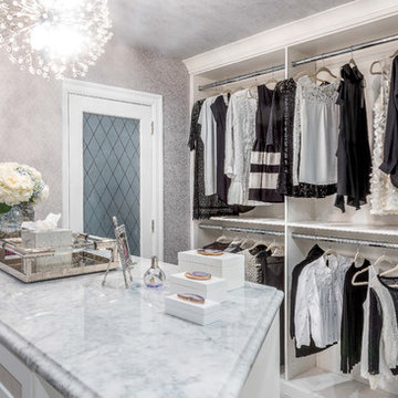Dazzling Transitional His and Hers Master Closets