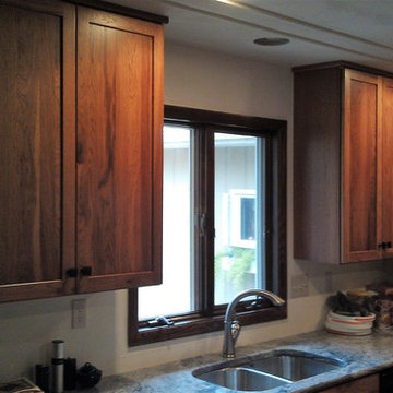 Omega Cabinetry, Puritan door, Pecan wood, Natural finish.