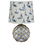 AHS Lighting - Fisherman's Friend Table Lamp With Shade, Seaview - This 20"H clear glass ball lamp base is wrapped in natural jute rope for a nautical look. The 12" drum shade features small blue sail boats on a white ground. An ideal design for a sea side or lake side home. These lamps are beautiful as a pair in a bedroom or living room. A lovely accent piece alone on a hall table
