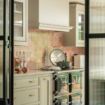 Kitchen renovation with crittall doors antique tiles