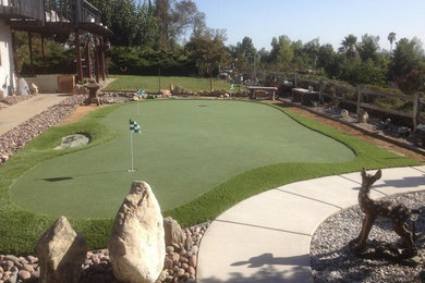 This is an example of a traditional backyard outdoor basketball/tennis/multi-game court in Los Angeles.
