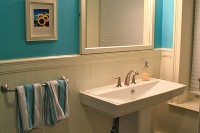 Mid-sized trendy master beige tile and ceramic tile single-sink, porcelain tile and gray floor bathroom photo in Philadelphia with a pedestal sink, a one-piece toilet and blue walls