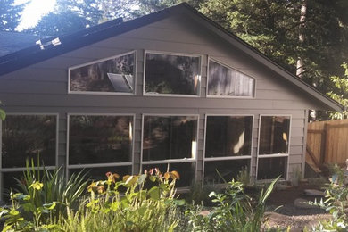 Inspiration for a tropical sunroom remodel in Portland