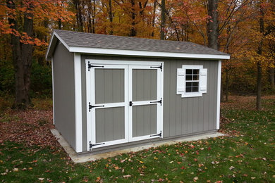 Mid-sized transitional detached garden shed in Columbus.