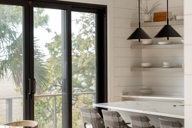 Example of a minimalist kitchen design in Charleston