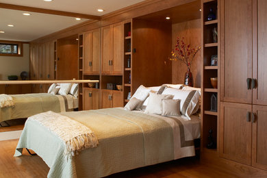 Modern master bedroom in San Francisco with light hardwood floors.