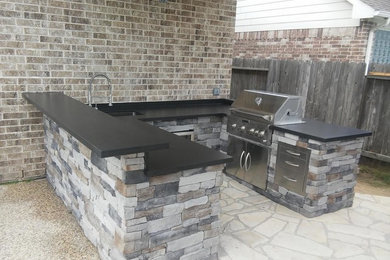 Patio - transitional patio idea in Houston