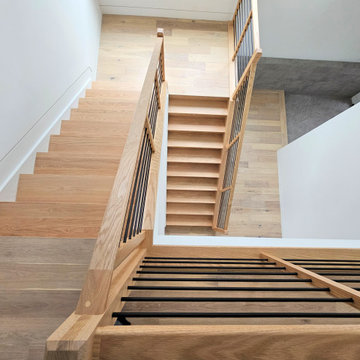 Project #108 | Red Oak Staircase in Light-Filled Space
