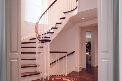 Inspiration for a traditional curved staircase in Columbus.