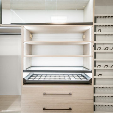 Luxurious Walk-In closet with LED lighting and glass sliding doors