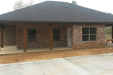Brick exterior home photo in Other