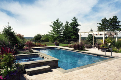Inspiration for a large traditional pool in Chicago.