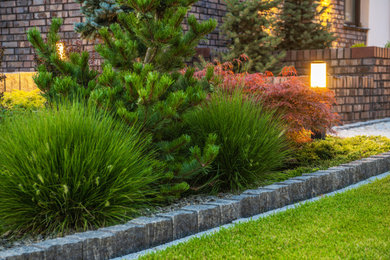 シアトルにある高級な中くらいな地中海スタイルのおしゃれな庭 (半日向、天然石敷き) の写真