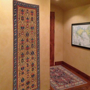 Antique Caucasian Rugs Offer a Variety of Design Styles in Hall