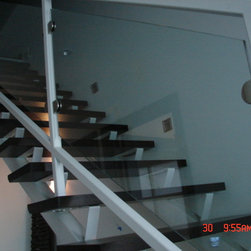 Steel stairs with glass panel - Products