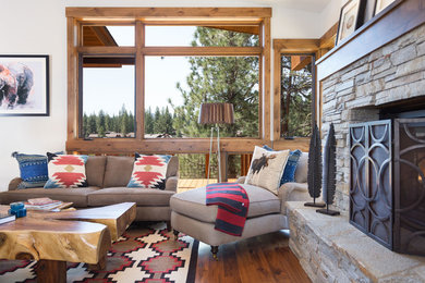 Living room - large contemporary formal and open concept medium tone wood floor living room idea in Sacramento with white walls, a standard fireplace, a stone fireplace and no tv