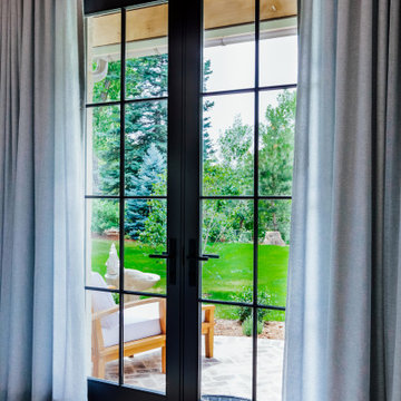 Functional Drapes with 2-Finger Pinch Pleat on a Matte Black Traverse Rod