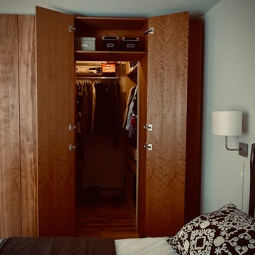 Home-made cherry panels bedroom with secret passage