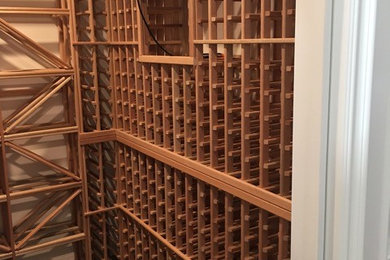 Inspiration for a traditional wine cellar in Orange County.