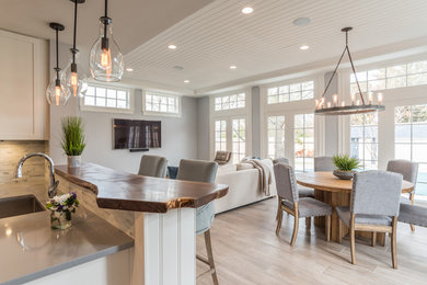 Family room - large contemporary enclosed porcelain tile and beige floor family room idea in DC Metro with gray walls, no fireplace and a wall-mounted tv