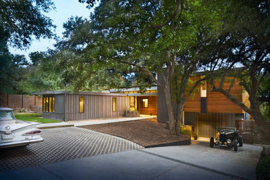 Photo of a contemporary two-storey house exterior in Austin.