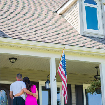Seamless Polymer Siding in Mountain Clay w/ Energy Efficient Replacement Windows