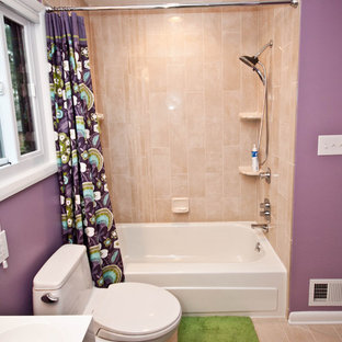 Example of a mid-sized trendy kids' beige tile and porcelain tile porcelain floor bathroom design in Baltimore with flat-panel cabinets, white cabinets, a two-piece toilet, purple walls, an integrated sink and laminate countertops
