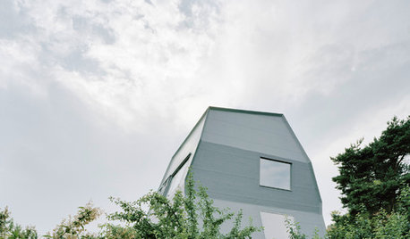 Schirm, Charme und Kautschuk: Kompakter Wohnturm in Tübingen