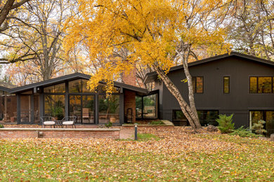 Inspiration for a mid-century modern exterior home remodel in Minneapolis
