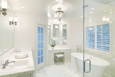 Example of a classic white tile bathroom design in DC Metro with an undermount sink, recessed-panel cabinets, white cabinets and marble countertops