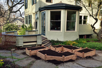 Design ideas for a small victorian partial sun courtyard stone vegetable garden landscape in Boston for summer.