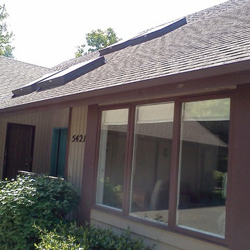 Facelift to modernize house & expand over garage