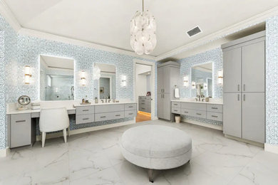 Example of a huge trendy master porcelain tile, beige floor, vaulted ceiling and wallpaper bedroom design in Miami with multicolored walls