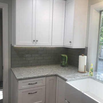 Removed soffited ceilings and took cabinets to new ceiling