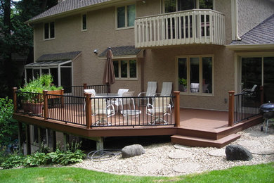 Trendy backyard deck photo in Minneapolis