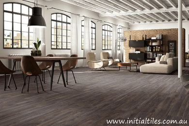 Inspiration for a modern living room in Sydney with porcelain floors.