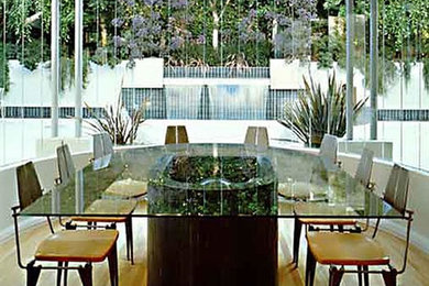 Mid-sized trendy light wood floor dining room photo in San Francisco with beige walls